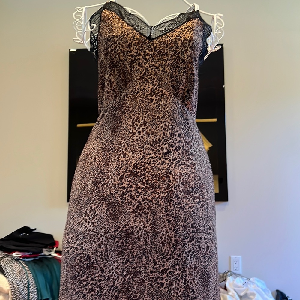 Leopard print slip dress.  Spaghetti straps. Lace detail